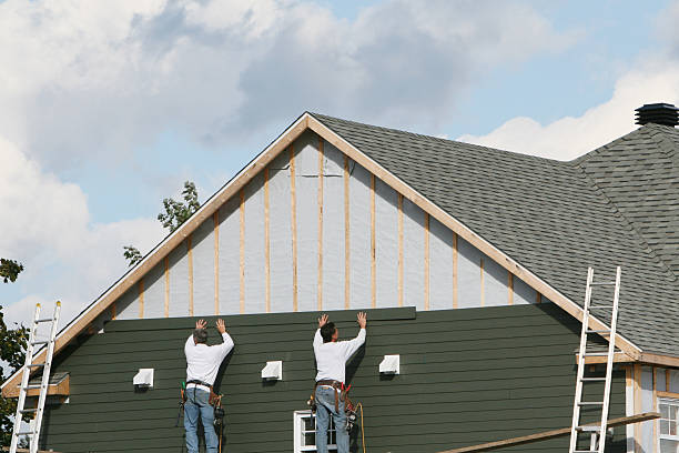 Professional Siding Installation technician working in Buies Creek, NC